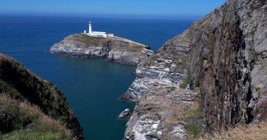 The image shows the cliff and light house at southstack