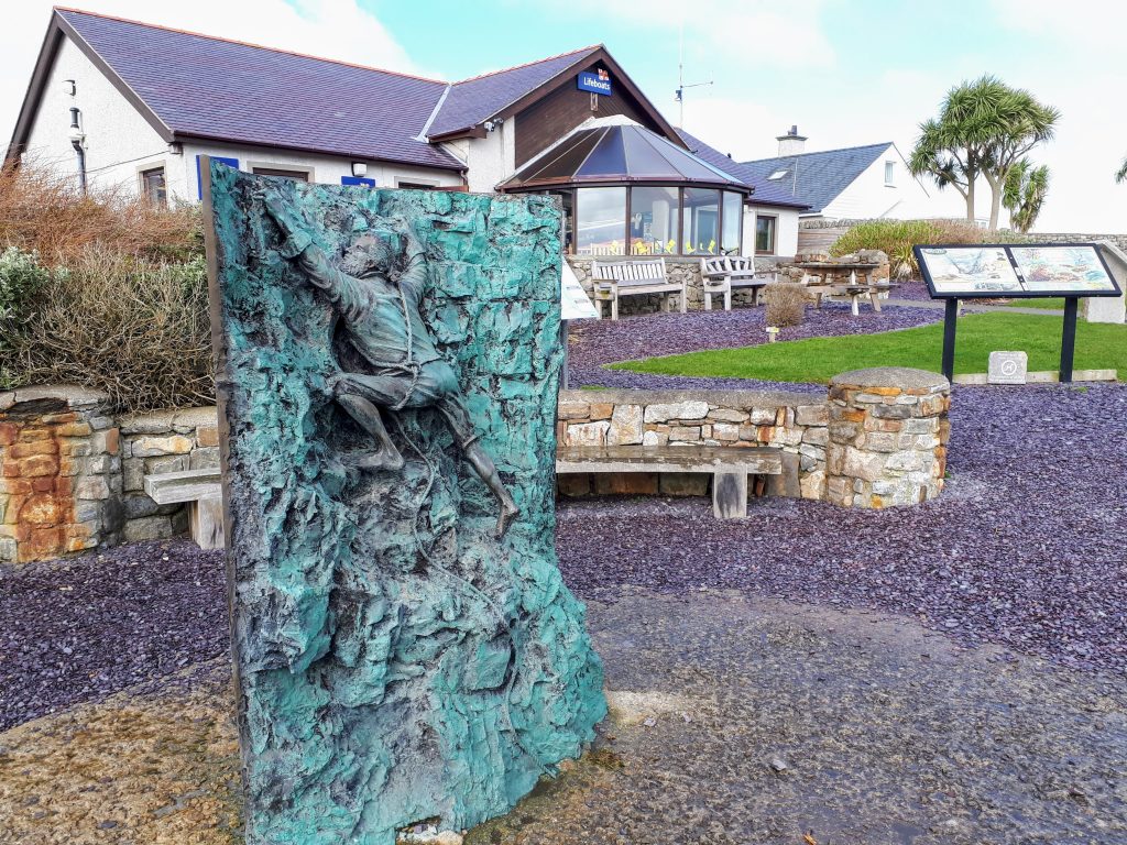A statue outside Moelfre sea watch depicting Joseph Rogers daring rescue attempt (Royal Charter clipper sinking at Moelfre)