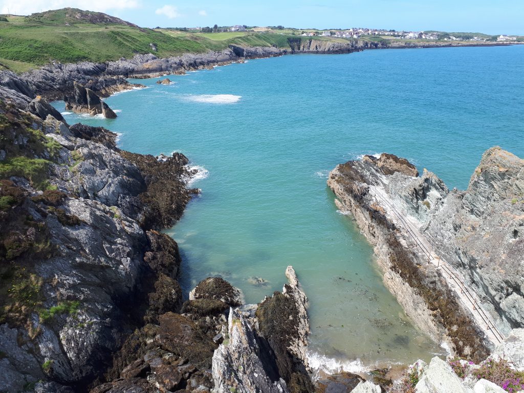a  picture of the swimming area known as the creek in Amlwch